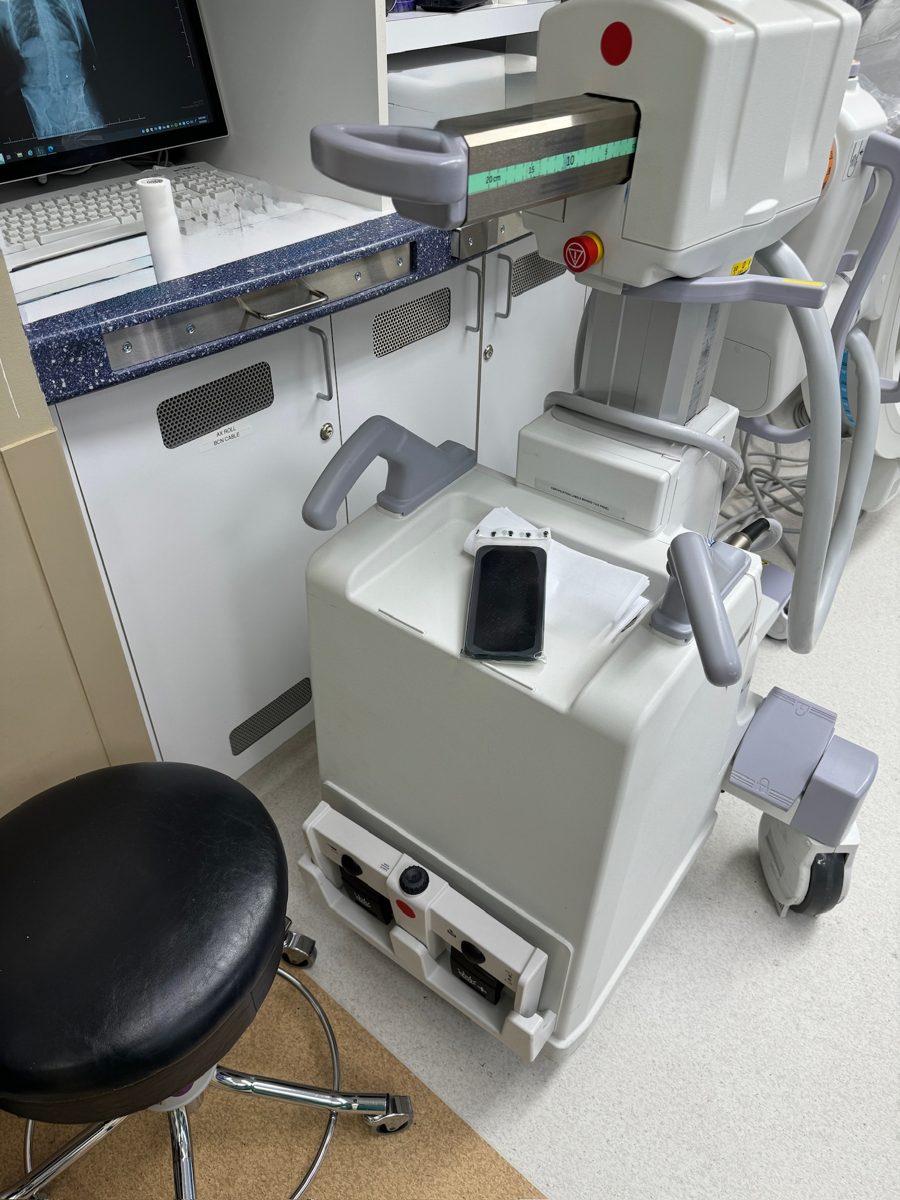 WynnShield™-wrapped phone on top of a mobile imaging unit in a clinic
